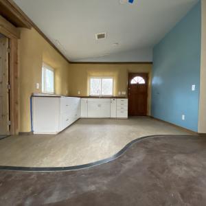 Kitchen view incl. marmoleum and earthen floors